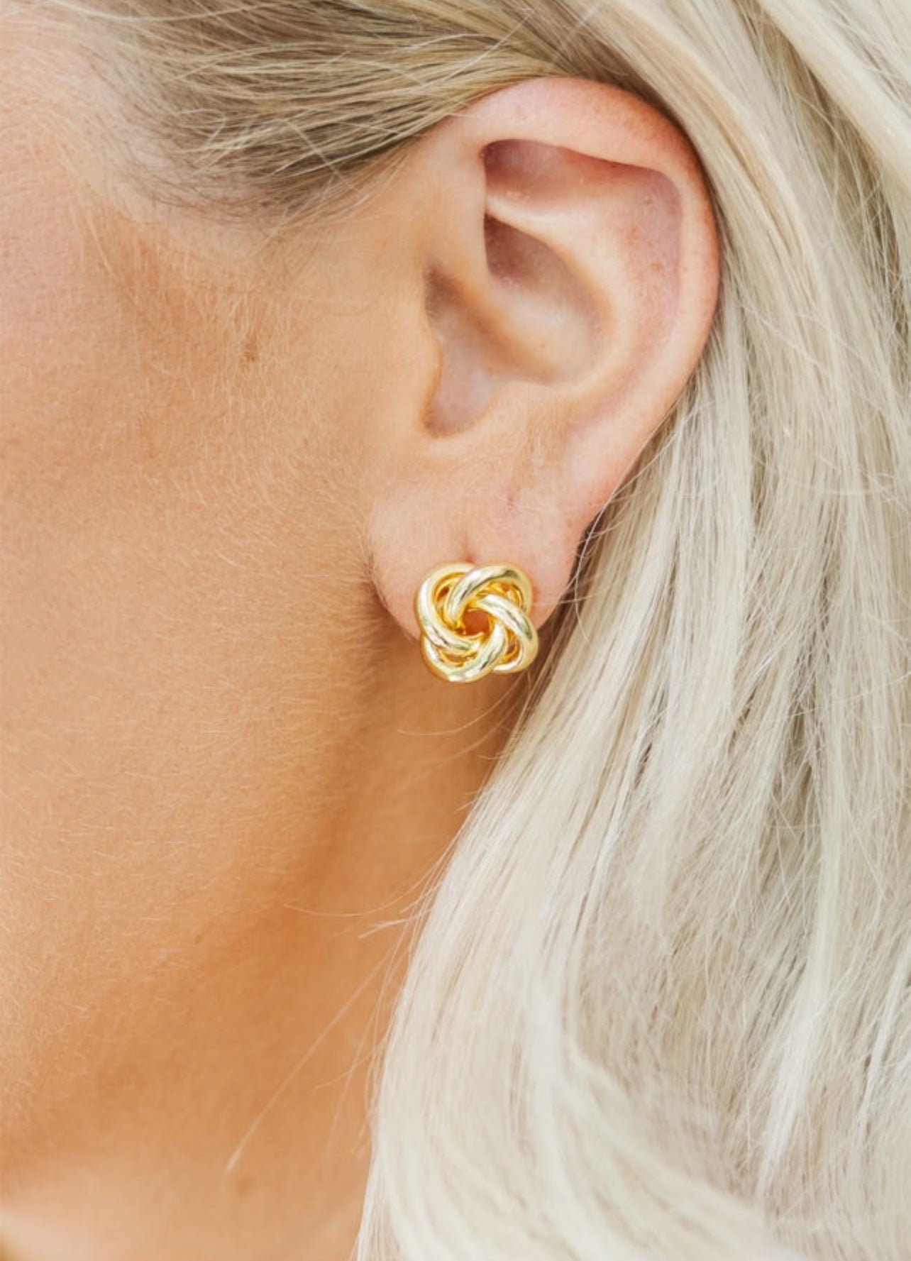 Gold knotted stud earrings