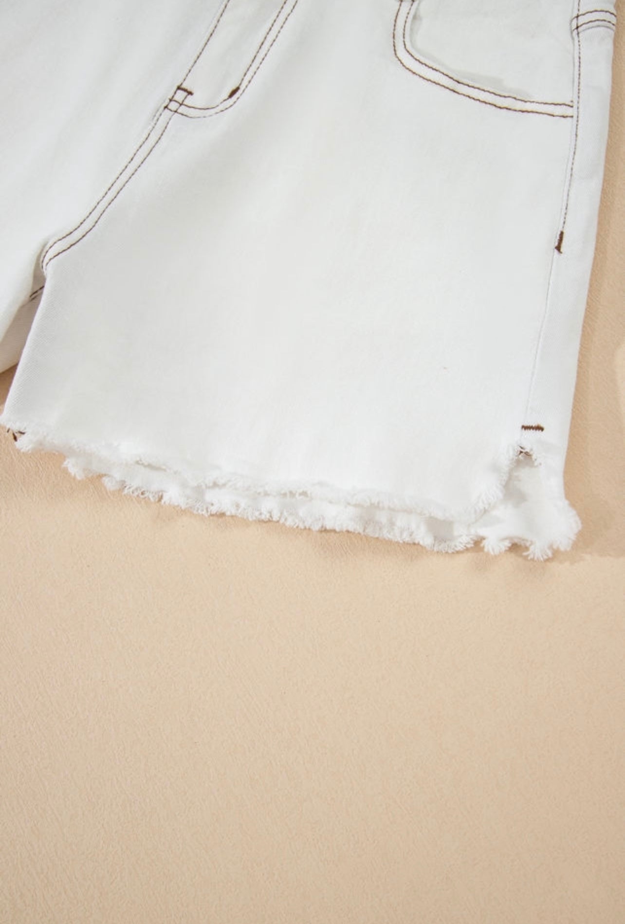 White raw hem high waisted denim shorts