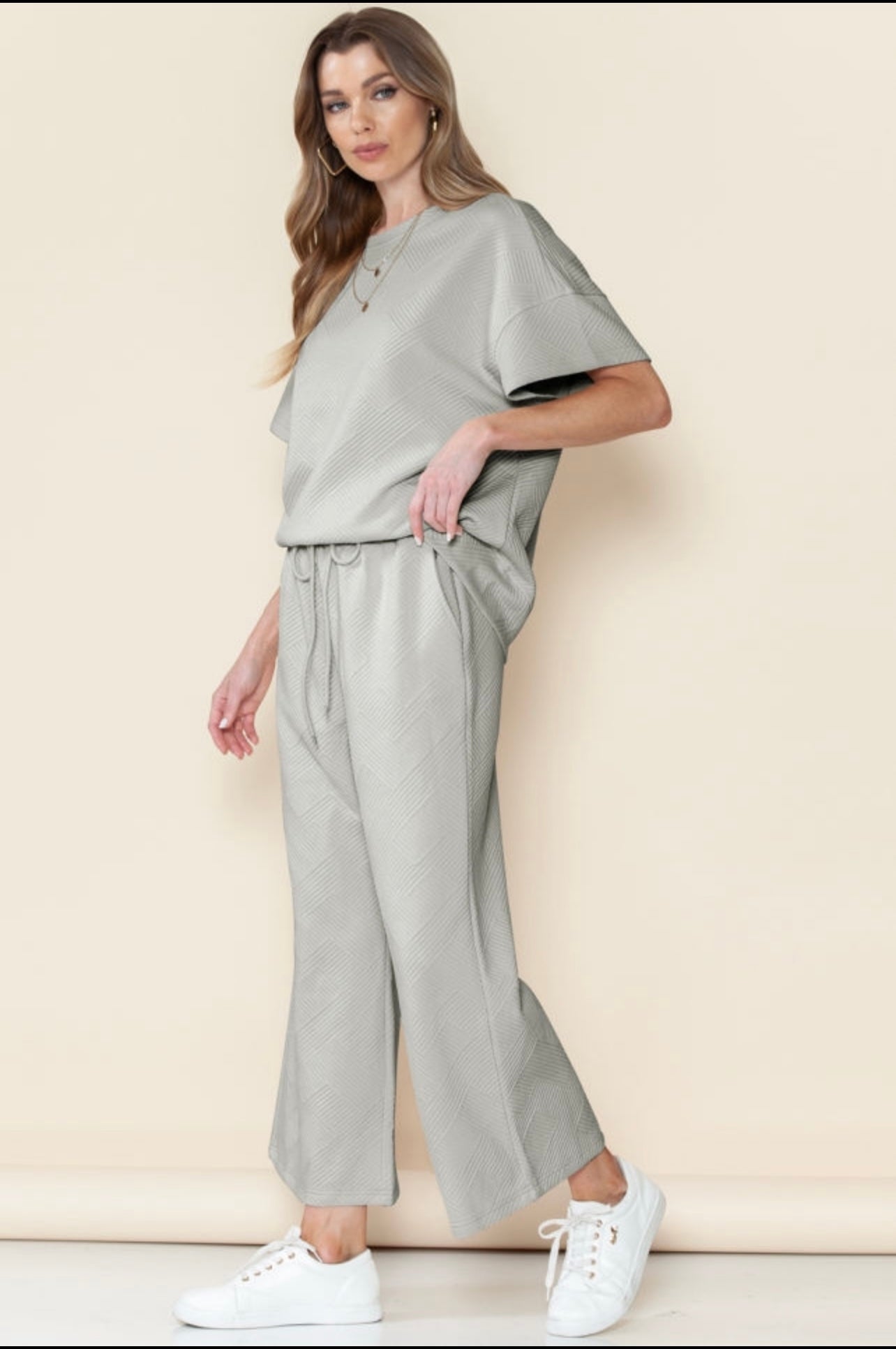 Gray textured loose fit T shirt and drawstring pants.