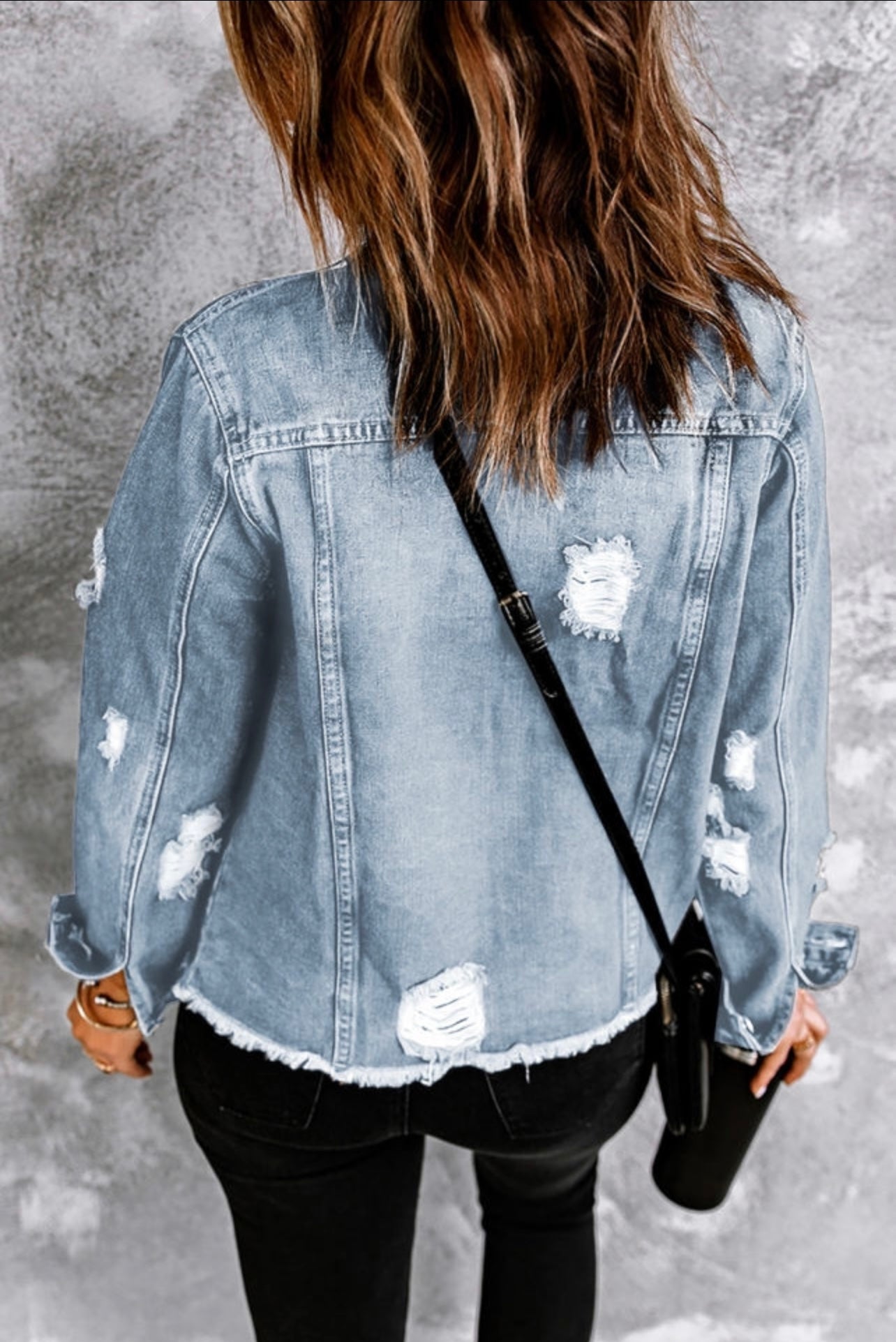 Distressed ripped jean jacket